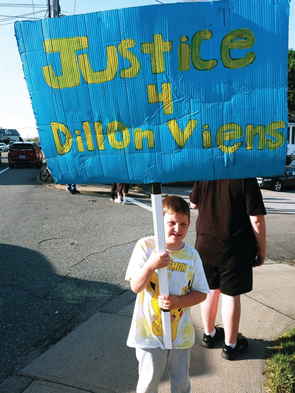 RALLY FOR JUSTICE: Friends and family of Dillon Viens rally in Johnston several weeks ago, demanding stricter gun storage laws and more charges in Dillon’s shooting death. Nearly four months have passed, and Johnston Police and the Rhode Island Attorney General’s Office say they are still investigating the case.